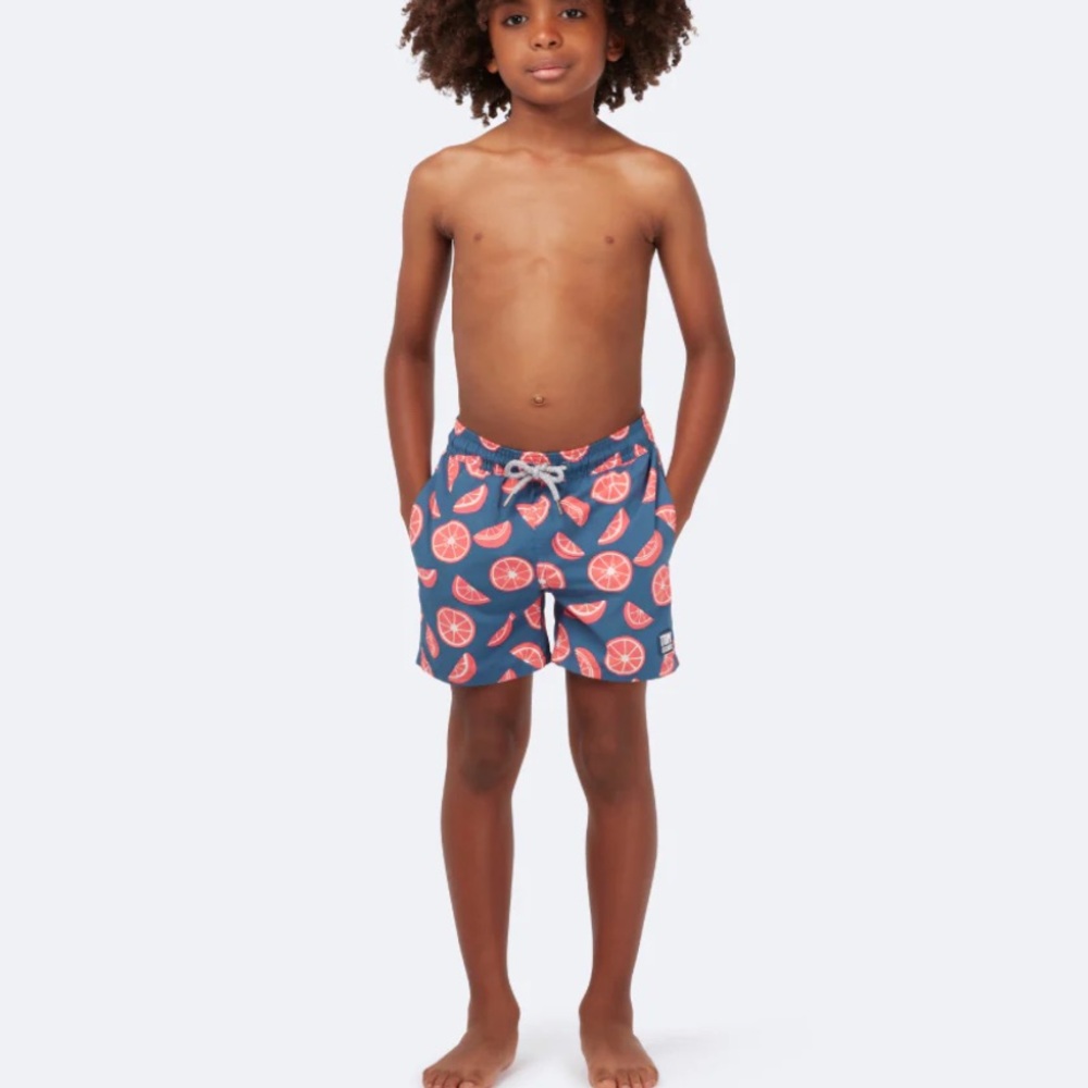 Tom & Teddy Blue and Red swim trunks with Playful Print, size 11/12